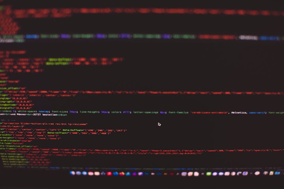 A computer screen displaying a dense display of colorful programming code with lines of text in various colors including blue, green, yellow, red, and white. The code appears to be written in a script